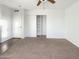 Large bedroom featuring hardwood floors and built-in shelving at 2843 E Pershing Ave, Phoenix, AZ 85032