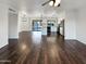 Open concept kitchen with an island, hardwood floors, and modern amenities at 2843 E Pershing Ave, Phoenix, AZ 85032