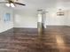 Spacious living room with hardwood floors and access to other areas of the home at 2843 E Pershing Ave, Phoenix, AZ 85032