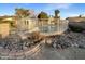 Inviting kidney-shaped pool surrounded by rock landscaping at 2843 E Pershing Ave, Phoenix, AZ 85032