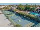 Aerial view of community amenities including tennis courts, pool, and spa at 3031 N Civic Center Plz # 228, Scottsdale, AZ 85251