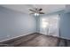 Well-lit bedroom with ceiling fan and wood-look floors at 3031 N Civic Center Plz # 228, Scottsdale, AZ 85251