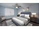 Elegant bedroom with a tufted headboard and wood nightstands at 3031 N Civic Center Plz # 228, Scottsdale, AZ 85251