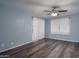 Spacious bedroom with sliding door and wood-look floors at 3031 N Civic Center Plz # 228, Scottsdale, AZ 85251