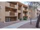 Condo building exterior with walkway and landscaping at 3031 N Civic Center Plz # 228, Scottsdale, AZ 85251