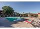 Relaxing pool area with lounge chairs, and a shaded seating area at 3031 N Civic Center Plz # 228, Scottsdale, AZ 85251