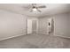 Bright bedroom featuring carpeted floor and ceiling fan at 3104 W Carlos Ln, San Tan Valley, AZ 85144