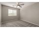 Bright bedroom with window blinds and ceiling fan at 3104 W Carlos Ln, San Tan Valley, AZ 85144