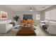 Virtually staged living room with two sofas and a coffee table at 3104 W Carlos Ln, San Tan Valley, AZ 85144