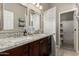 Bathroom with double vanity, granite countertop, and shower at 31847 N 53Rd St, Cave Creek, AZ 85331