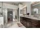 Elegant bathroom with granite countertops and a large shower at 31847 N 53Rd St, Cave Creek, AZ 85331