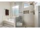 Clean bathroom with a shower, tub, and large window at 31847 N 53Rd St, Cave Creek, AZ 85331