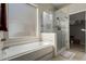 Modern bathroom featuring a soaking tub and glass shower enclosure at 31847 N 53Rd St, Cave Creek, AZ 85331