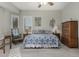 Comfortable bedroom with a king-size bed and plenty of sunlight at 31847 N 53Rd St, Cave Creek, AZ 85331