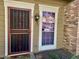 Front door and a window of a tan home at 3329 W Mcrae Way # 4, Phoenix, AZ 85027