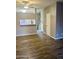 Living room with wood-look floors and a fireplace at 3329 W Mcrae Way # 4, Phoenix, AZ 85027