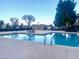 Community pool with ample deck space and seating at 3329 W Mcrae Way # 4, Phoenix, AZ 85027