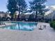 Inviting community pool with surrounding homes visible at 3329 W Mcrae Way # 4, Phoenix, AZ 85027