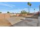 Spacious backyard with a large concrete patio area at 3740 W Denton Ln, Phoenix, AZ 85019