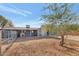 Private backyard with a covered patio and fenced area at 3740 W Denton Ln, Phoenix, AZ 85019