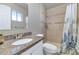 Clean bathroom with shower/tub combo and granite countertop at 3740 W Denton Ln, Phoenix, AZ 85019