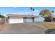 Ranch style home with a single car garage and landscaped front yard at 3740 W Denton Ln, Phoenix, AZ 85019