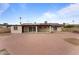 Home exterior and expansive backyard with brick pavers at 3815 E Cortez St, Phoenix, AZ 85028