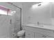 Modern bathroom with a walk-in shower and white vanity at 3815 E Cortez St, Phoenix, AZ 85028