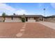 Single story home with a landscaped front yard and stone pathway at 3815 E Cortez St, Phoenix, AZ 85028