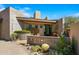 Modern home's entrance with block wall and drought-tolerant landscaping at 39349 N 107Th Way, Scottsdale, AZ 85262