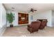 Bright Gathering room with two recliners and built-in shelving at 42593 W Falling Star Ct, Maricopa, AZ 85138