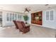 Bright Gathering room with two recliners and built-in shelving at 42593 W Falling Star Ct, Maricopa, AZ 85138