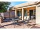 Outdoor patio with seating area and built-in grill at 42593 W Falling Star Ct, Maricopa, AZ 85138