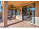 Covered patio with sliding glass doors at 42593 W Falling Star Ct, Maricopa, AZ 85138