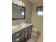 Bathroom with single vanity, marble countertop, and toilet at 4302 E Rockledge Rd, Phoenix, AZ 85044