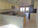 Kitchen with granite countertops and light-colored cabinets at 4302 E Rockledge Rd, Phoenix, AZ 85044