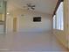 Bright living room with tile flooring and large windows at 4302 E Rockledge Rd, Phoenix, AZ 85044