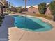 Inviting kidney-shaped pool surrounded by a patio at 4302 E Rockledge Rd, Phoenix, AZ 85044