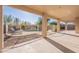 Covered patio overlooks a refreshing pool and fenced backyard at 4615 E Bent Tree Dr, Cave Creek, AZ 85331