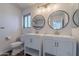 Modern bathroom with dual vanity and updated fixtures at 4615 E Bent Tree Dr, Cave Creek, AZ 85331