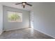 Cozy bedroom with tile floors and a view of the backyard at 4615 E Bent Tree Dr, Cave Creek, AZ 85331