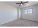 Bright bedroom with ceiling fan and carpet at 4615 E Bent Tree Dr, Cave Creek, AZ 85331