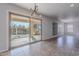 Bright dining area with sliding door leading to a backyard pool at 4615 E Bent Tree Dr, Cave Creek, AZ 85331