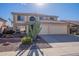 Two-story house with three-car garage and desert landscaping at 4615 E Bent Tree Dr, Cave Creek, AZ 85331