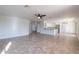 Open living room with tile floors and kitchen views at 4615 E Bent Tree Dr, Cave Creek, AZ 85331