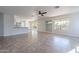 Open living area with tile floors and built-in shelving at 4615 E Bent Tree Dr, Cave Creek, AZ 85331