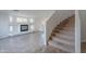 Living room with fireplace and staircase, offering an open concept at 4615 E Bent Tree Dr, Cave Creek, AZ 85331