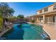 Inviting kidney-shaped pool with a rock waterfall feature at 4615 E Bent Tree Dr, Cave Creek, AZ 85331