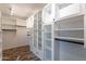 Large walk-in closet with custom shelving and lighting at 4615 E Bent Tree Dr, Cave Creek, AZ 85331