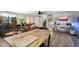 Living room with stairs and a large wooden table at 4902 W Cypress St, Phoenix, AZ 85035